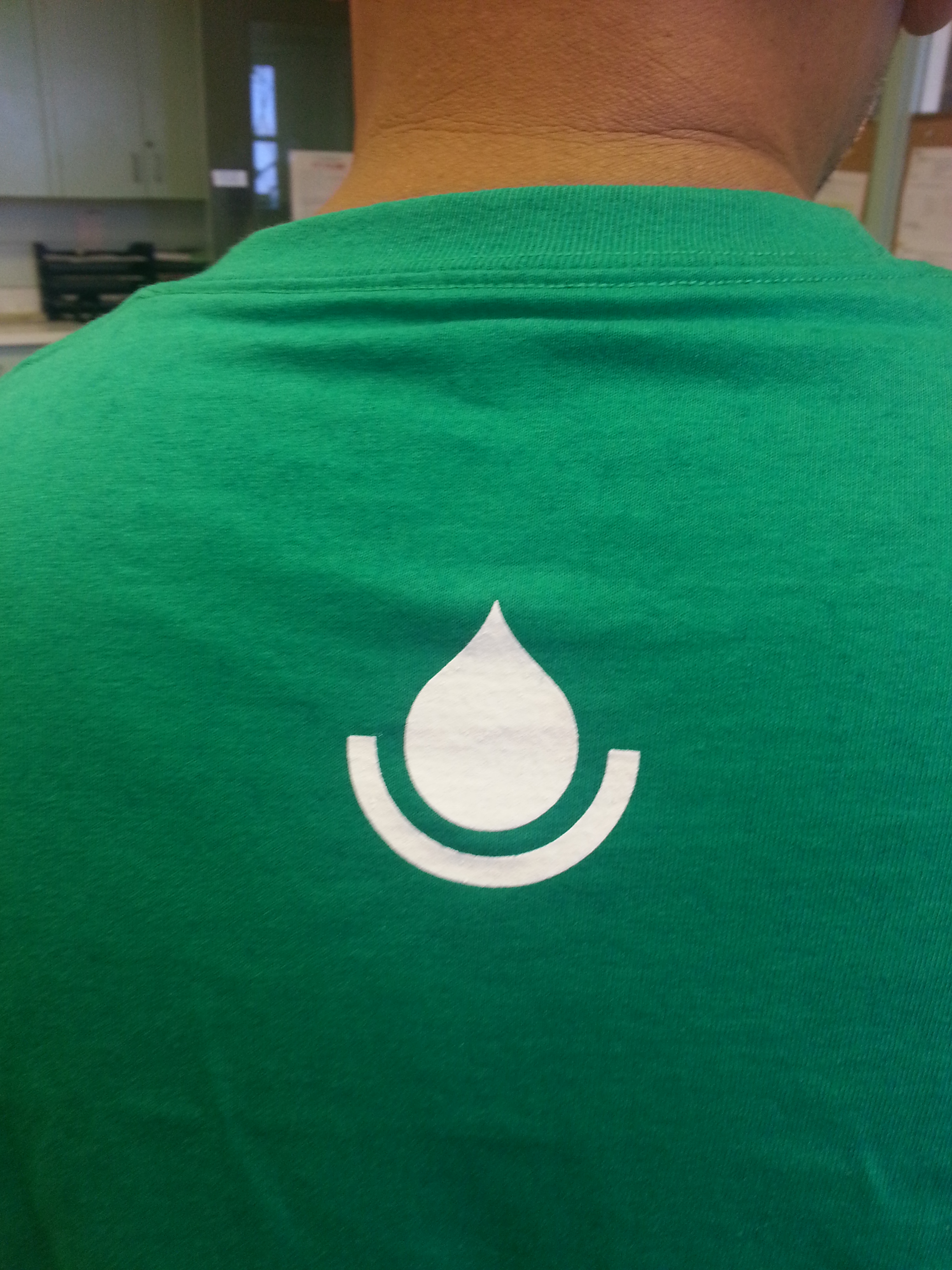back of bws shirt with water drop visible in the center